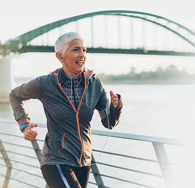 Chiropractic University Place WA Aspen Laser Woman Running